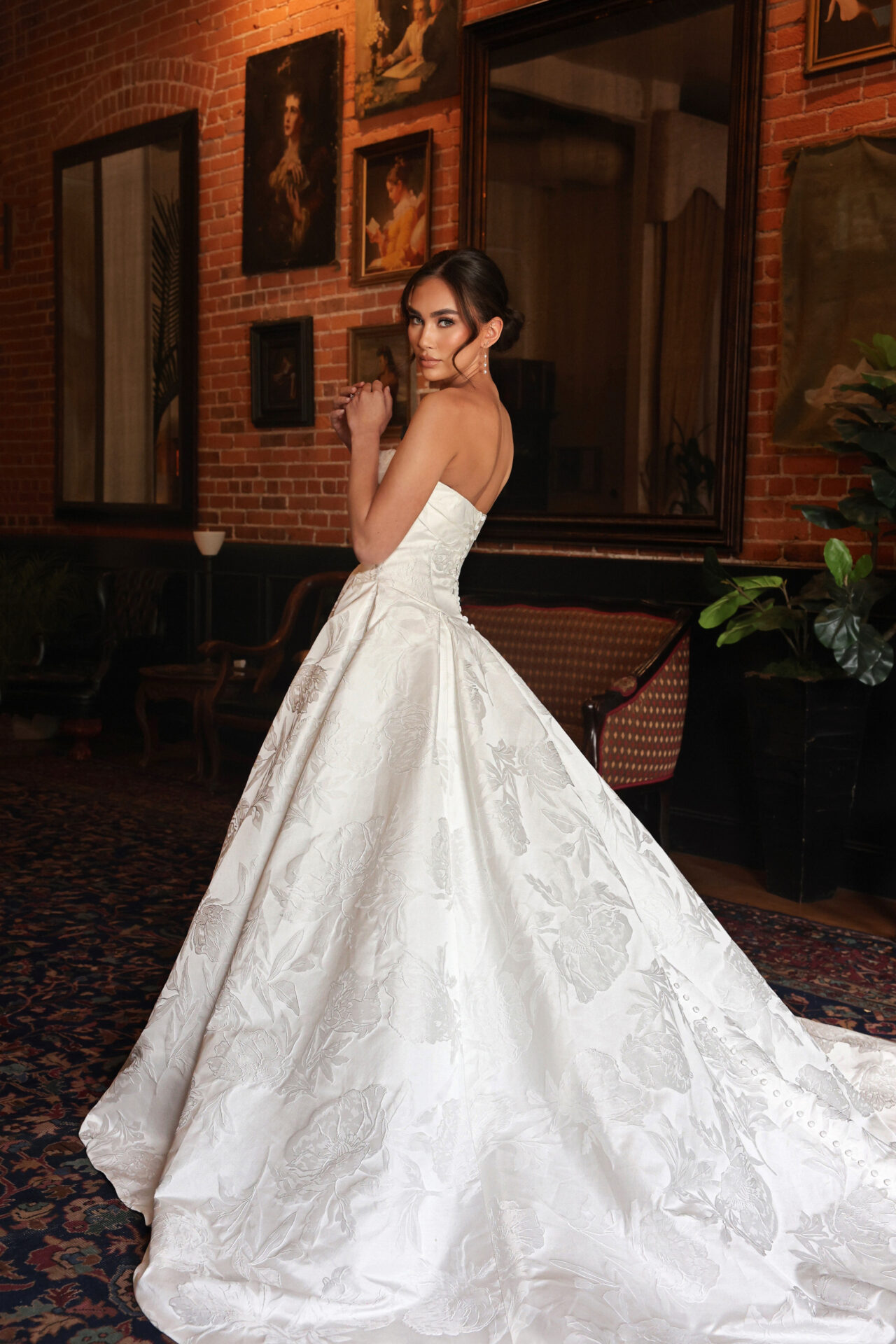 Essense of Australia wedding dress Style D4304 with strapless straight neckline, pleated satin skirt, and fabric-covered buttons