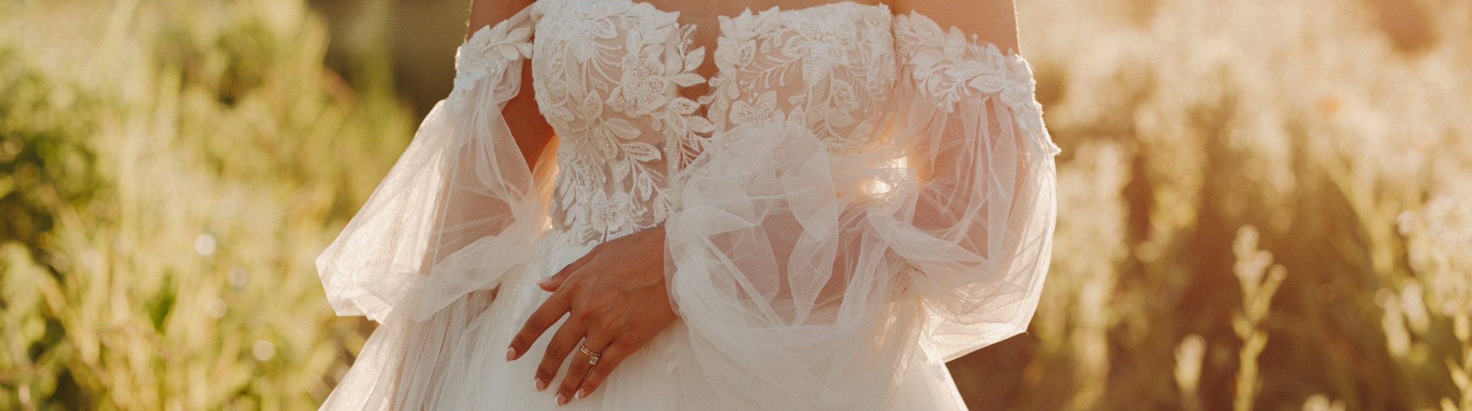 Western Boho Wedding Dress in a field